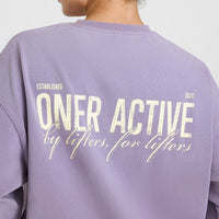 Oversized Graphic Washed Long Sleeve Top | Soft Purple