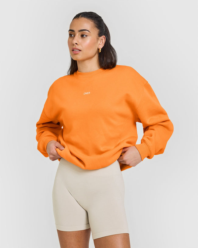 Foundations Raising the Bar Crew Neck Sweatshirt | Apricot Orange