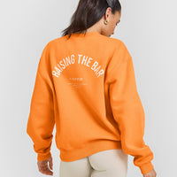 Foundations Raising the Bar Crew Neck Sweatshirt | Apricot Orange