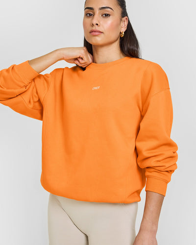 Foundations Raising the Bar Crew Neck Sweatshirt | Apricot Orange