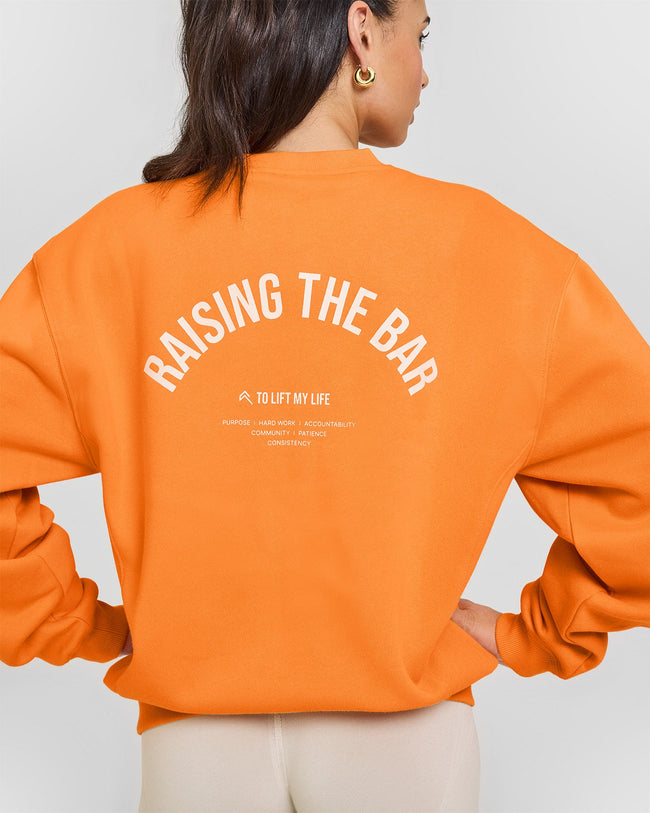 Foundations Raising the Bar Crew Neck Sweatshirt | Apricot Orange