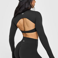 SoftMotion™ Long Sleeve Crop Top with White Logo | Soft Black