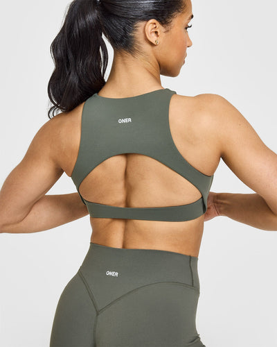 SoftMotion™ High Neck Sports Bra with White Logo | Dark Khaki