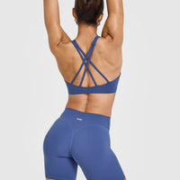 EasyLift™ High Neck Sports Bra with White Logo | Shadow Blue