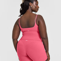 SoftMotion™ Strappy Mid Vest with Built in Bra Shelf with White Logo | Dark Velvet Pink