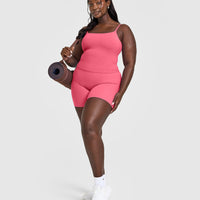 SoftMotion™ Strappy Mid Vest with Built in Bra Shelf with White Logo | Dark Velvet Pink
