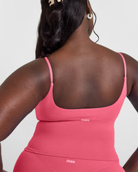 SoftMotion™ Strappy Mid Vest with Built in Bra Shelf with White Logo | Dark Velvet Pink