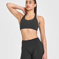 SoftMotion™ Sports Bra with White Logo | Soft Black
