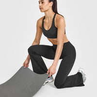 SoftMotion™ Sports Bra with White Logo | Soft Black
