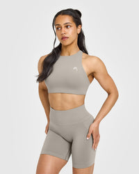 EasyLift™ High Neck Sports Bra with White Logo | Warm Sand