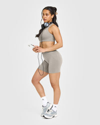 EasyLift™ High Neck Sports Bra with White Logo | Warm Sand