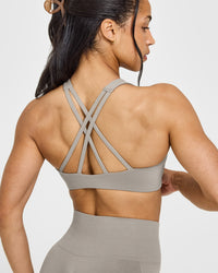 EasyLift™ High Neck Sports Bra with White Logo | Warm Sand