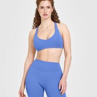 SoftMotion™ Bralette with White Logo | Glaucous Blue