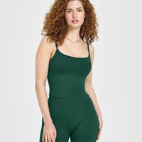 SoftMotion™ Strappy Mid Vest with Built in Bra Shelf with White Logo | Dark Racing Green