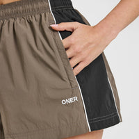 Oversized Piped Woven Track Shorts | Moss Brown