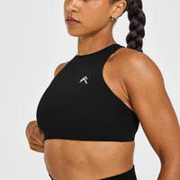 EasyLift™ High Neck Sports Bra with White Logo | Black
