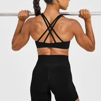 EasyLift™ High Neck Sports Bra with White Logo | Black