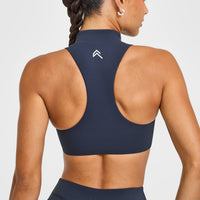 EasyLift™ Zip High Neck Sports Bra with White Logo | True Blue