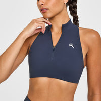 EasyLift™ Zip High Neck Sports Bra with White Logo | True Blue
