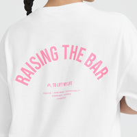 Raising The Bar Graphic Unisex T-Shirt | White