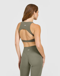 SoftMotion™ High Neck Sports Bra with White Logo | Alpine Green