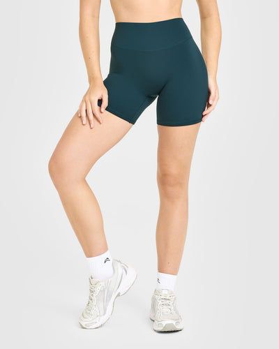 SoftMotion™ High Waisted Shorts 6" with White Logo | Oil Blue