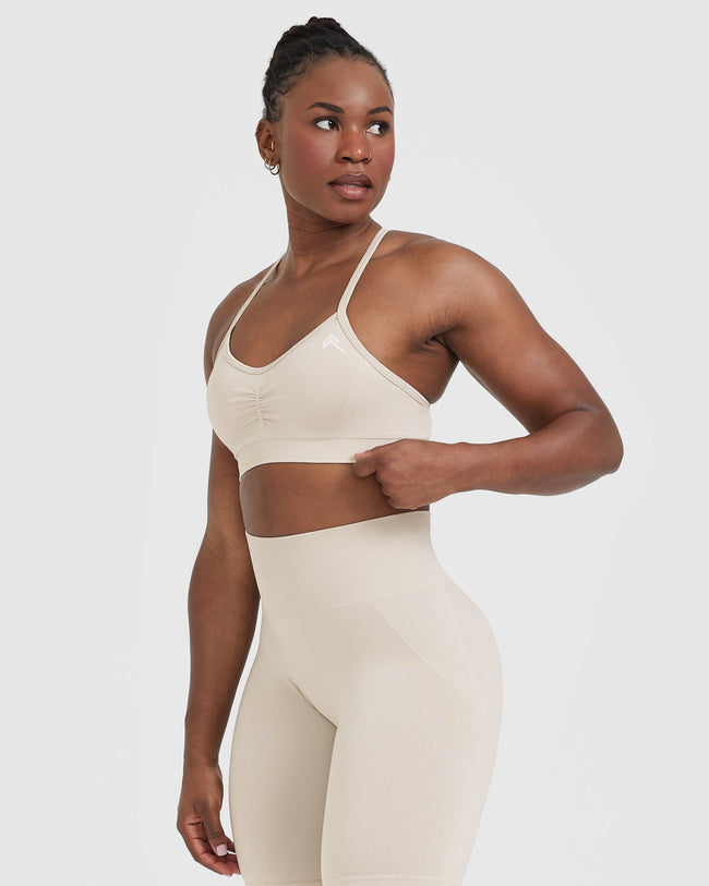 Effortless Strappy Bralette with White Logo | Sand