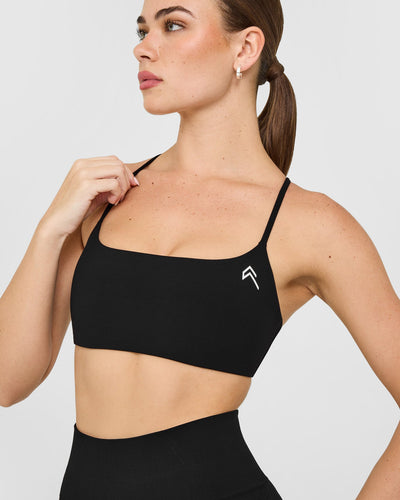 EasyLift™ Strappy Sports Bra with White Logo | Black
