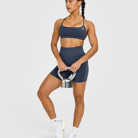 EasyLift™ Strappy Sports Bra with White Logo | True Blue