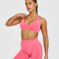 EffortlessLift™ Seamless Halter Neck Sports Bra with White Logo | Hot Girl Pink