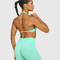 EnhanceLift™ Seamless Minimal Halter Neck Bralette with White Logo | Peppermint Green