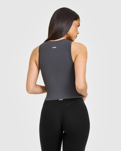 SoftMotion™ High Neck Mid Vest with White Logo | Coal