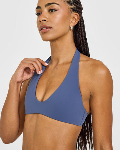 SoftMotion™ Minimal Halter Neck Bralette with White Logo | Slate Blue