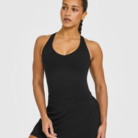 SoftMotion™ Racer Back Mid Vest with Built in Bra Shelf with White Logo | Black