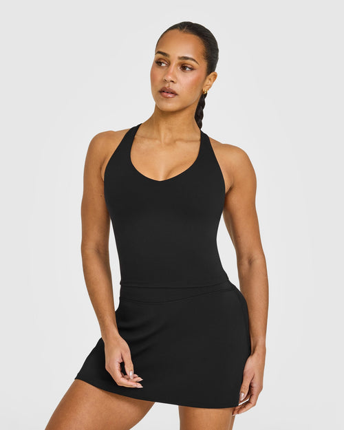 Oner Modal SoftMotion™ Racer Back Mid Vest with Built in Bra Shelf with White Logo | Black