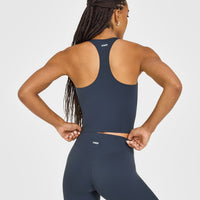 SoftMotion™ Racer Back Mid Vest with Built in Bra Shelf with White Logo | True Blue