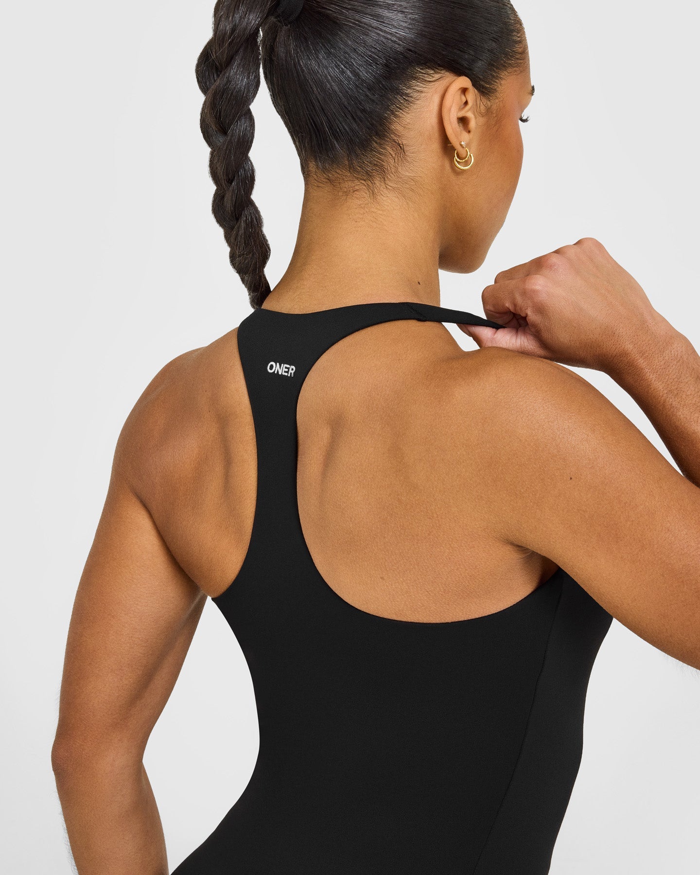 SoftMotion™ Racer Back Vest with Built in Bra Shelf with White Logo | Black