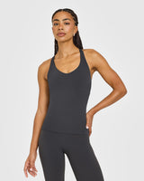 SoftMotion™ Racer Back Vest with Built in Bra Shelf with White Logo | Coal