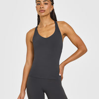 SoftMotion™ Racer Back Vest with Built in Bra Shelf with White Logo | Coal