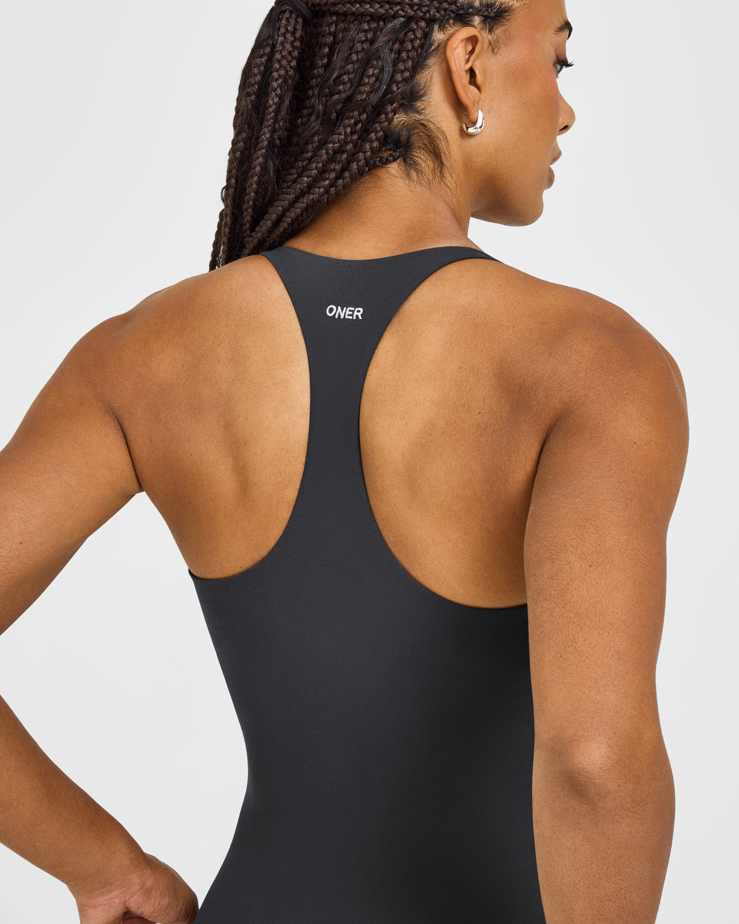 SoftMotion™ Racer Back Vest with Built in Bra Shelf with White Logo | Coal
