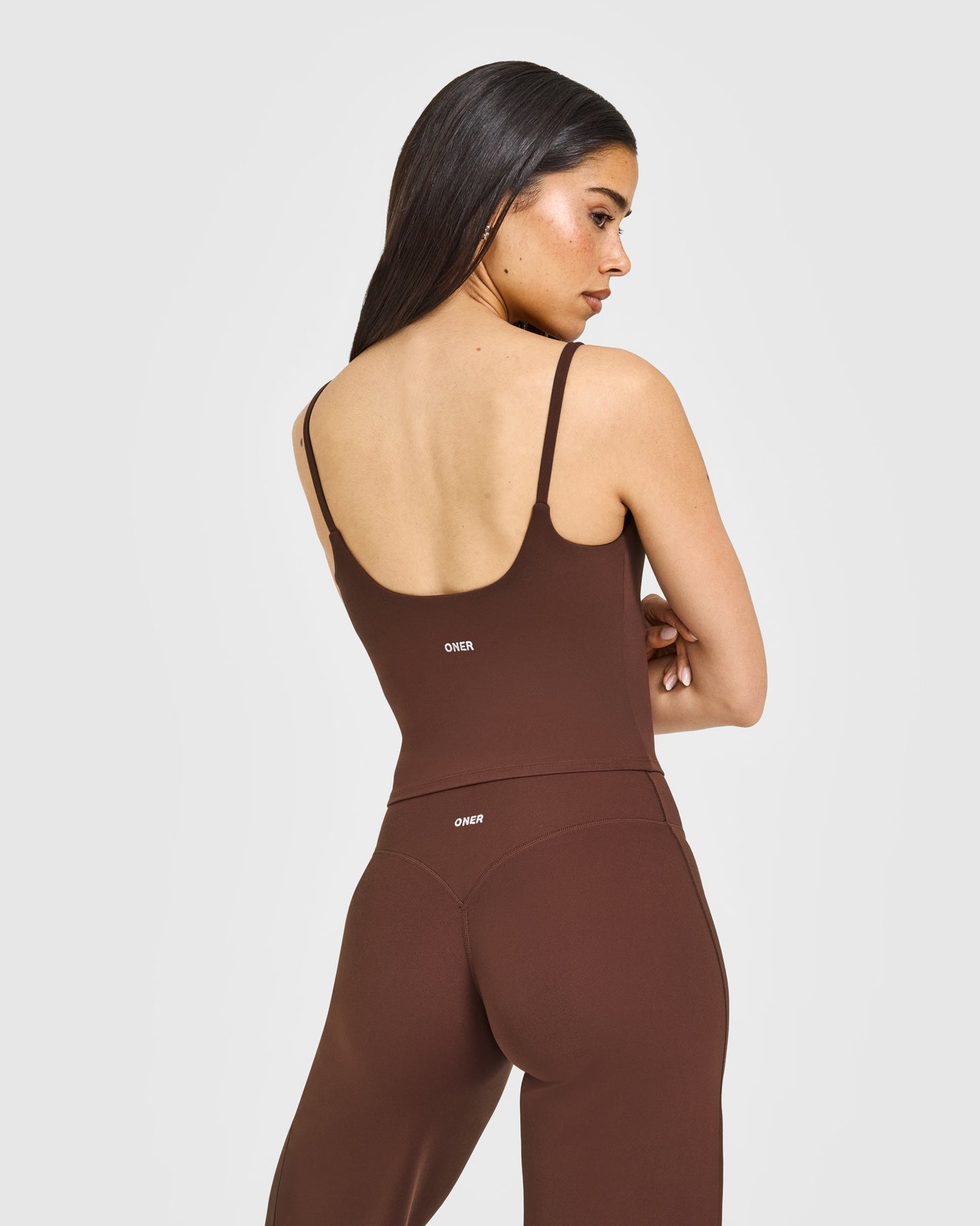 SoftMotion™ Strappy Mid Vest with Built in Bra Shelf with White Logo | Espresso Brown