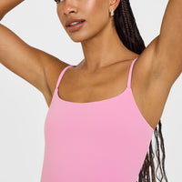 SoftMotion™ Strappy Mid Vest with Built in Bra Shelf with White Logo | Rose Pink