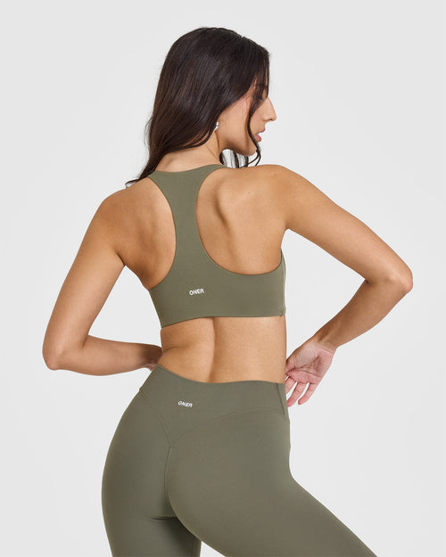 SoftMotion™ Sports Bra with White Logo | Alpine Green