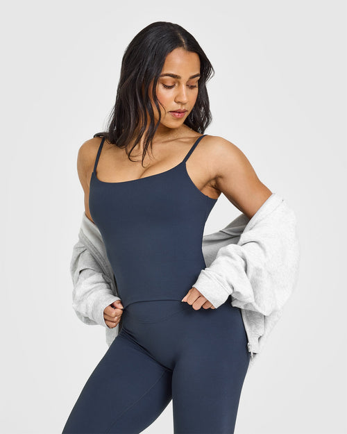 Oner Modal SoftMotion™ Strappy Mid Vest with Built in Bra Shelf with White Logo | True Blue