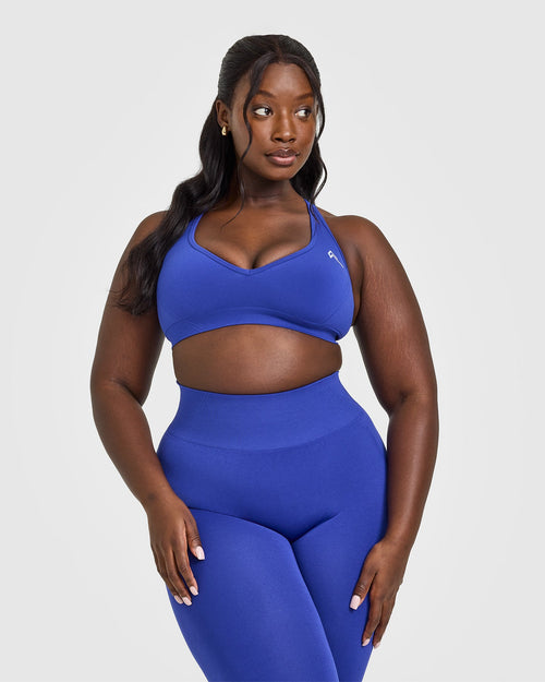 Oner Modal Effortless Seamless Racer Back Sports Bra with White Logo | Space Blue