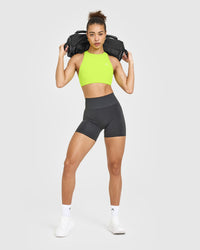 EasyLift™ High Neck Sports Bra with White Logo | Charged Lime Green