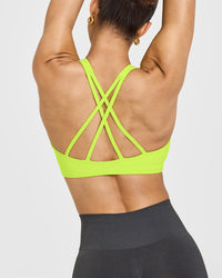 EasyLift™ High Neck Sports Bra with White Logo | Charged Lime Green