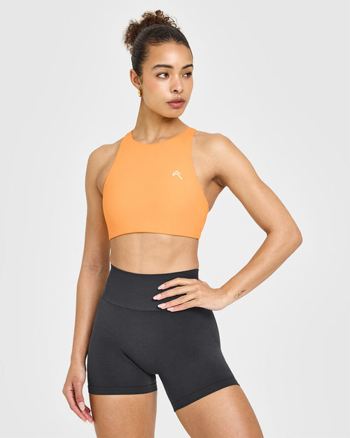 EasyLift™ High Neck Sports Bra with White Logo | Powdered Orange