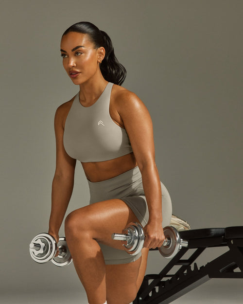 EasyLift™ High Neck Sports Bra with White Logo | Warm Sand