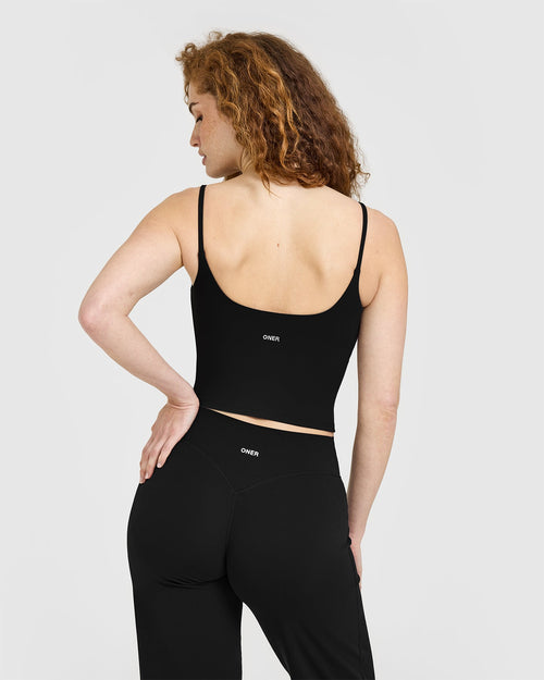 SoftMotion™ Strappy Mid Vest with Built in Bra Shelf with White Logo | Black